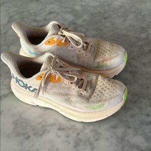 Hoka Clifton 9 Running Shoes in Vanilla (Cream and Orange with Green Accents)